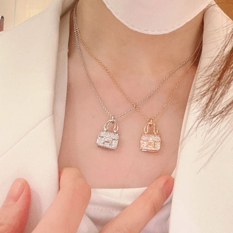 18K Hermes Amulettes Constance Pendant Necklace