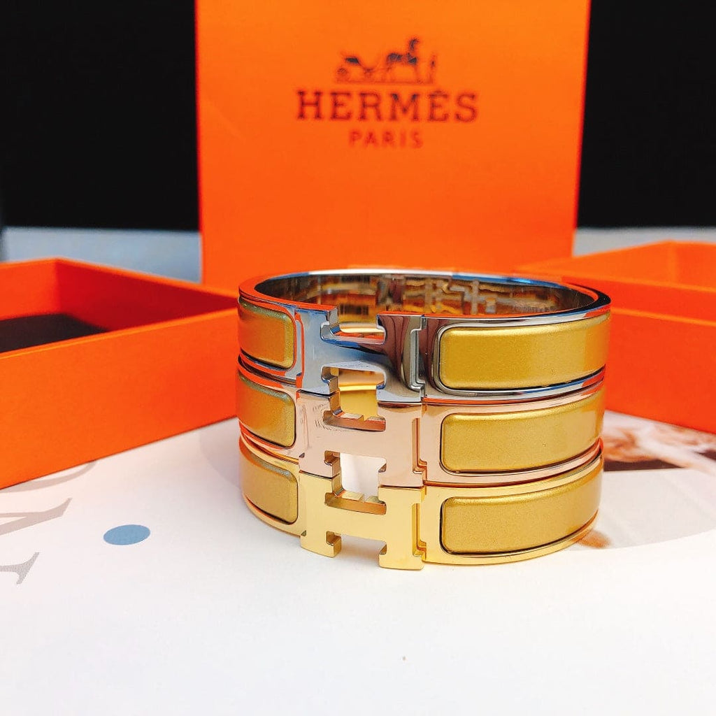 18K Hermes Clic Yellow Bracelet