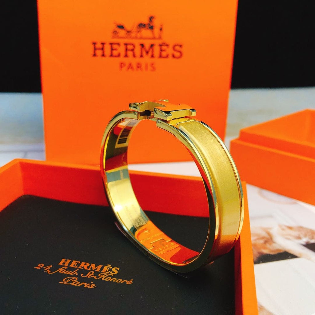 18K Hermes Clic Yellow Bracelet