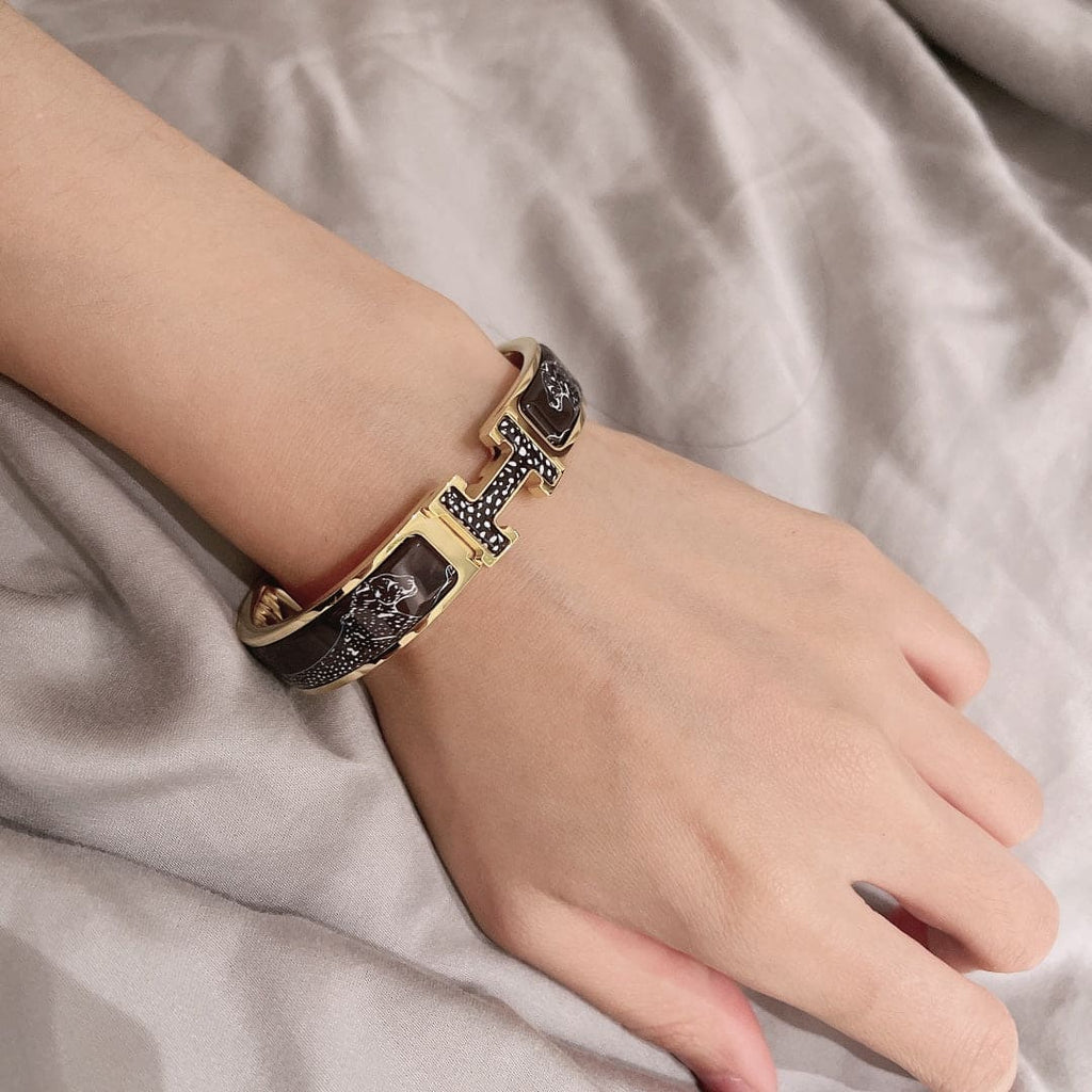 18K Hermes Guepards Clic Clac Bracelet