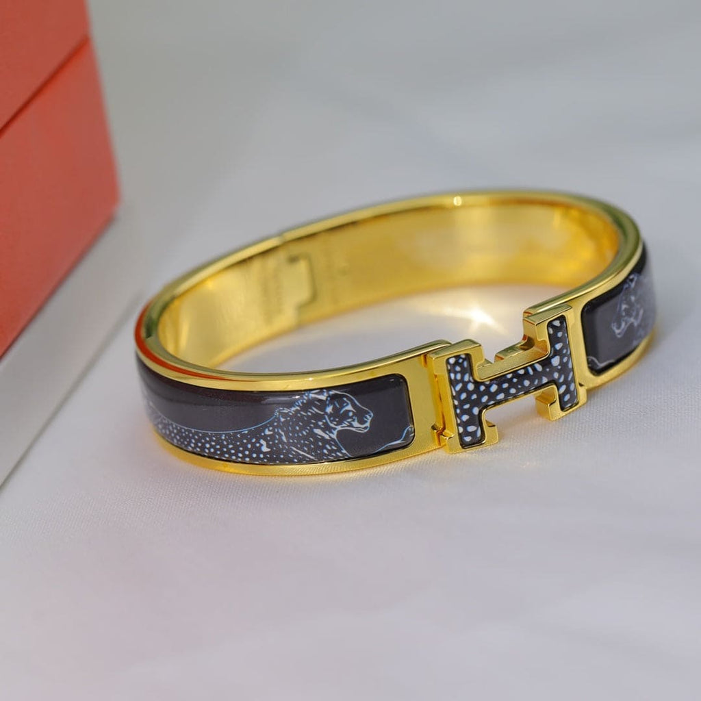 18K Hermes Guepards Clic Clac Bracelet