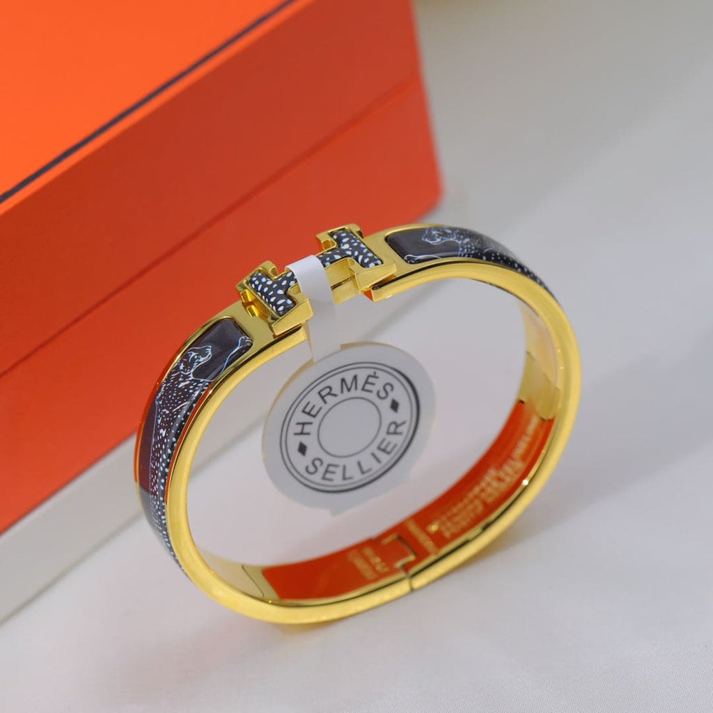 18K Hermes Guepards Clic Clac Bracelet