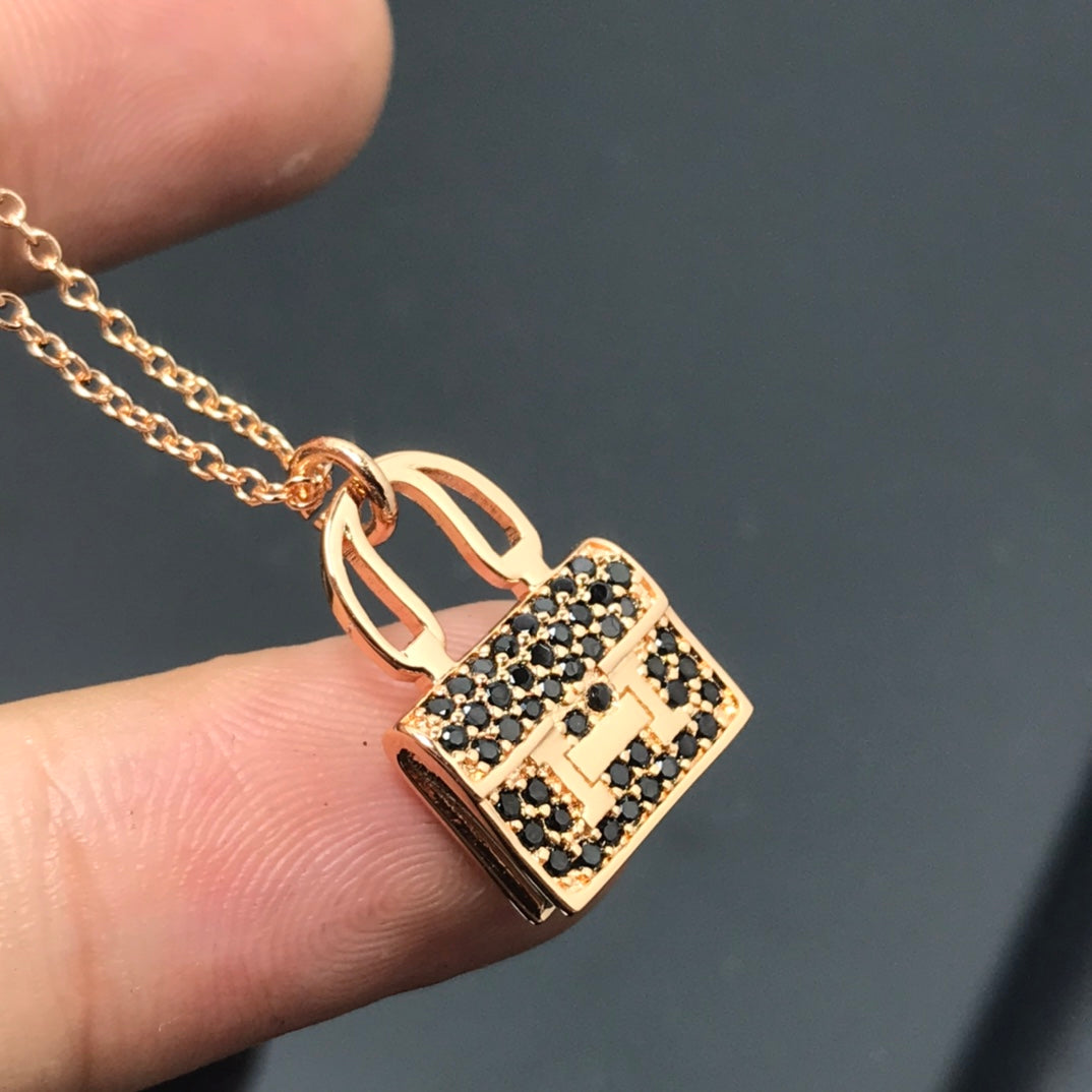 18K Hermes Amulettes Kelly Black Diamonds Necklace