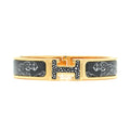 18K Hermes Guepards Clic Clac Bracelet