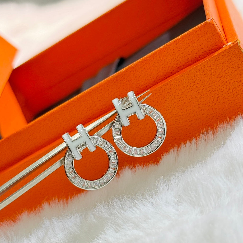 18K Hermes Clic Diamond Earrings