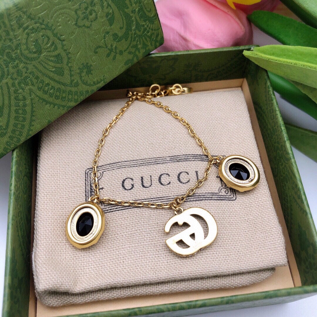 18K Gucci Double Black Stones Bracelet